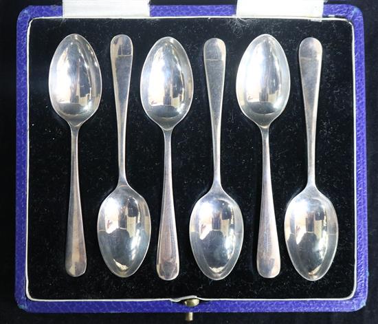 A set of six silver coffee spoons.